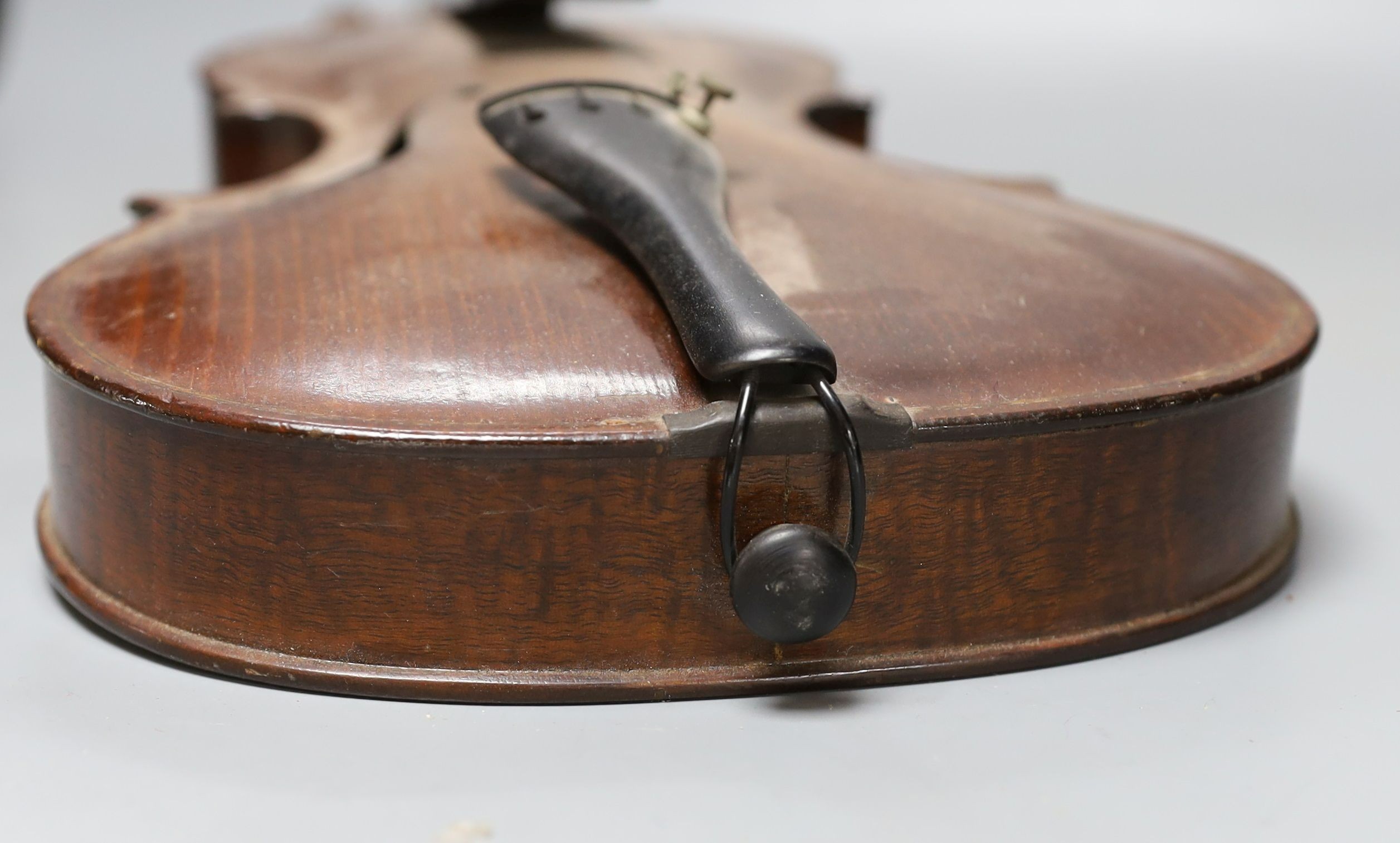 A cased 19th century violin